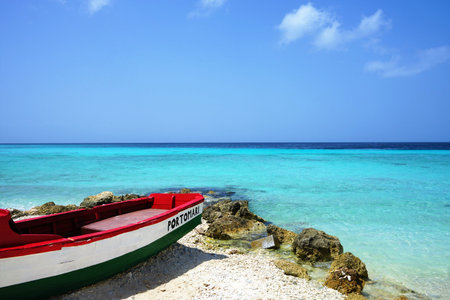 Porto Mari beach, Curacao / Netherlands Antilles - Boat on the beach in front of the Caribbean seaのeditorial素材