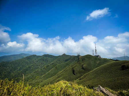 The small matcha mountains and the sky that are connected together become a magnificent beautyの写真素材