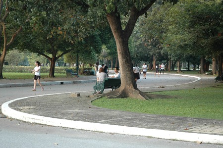 Nakhon Pathom, Thailand - November 11, 2013: People come to relax and playing badminton in the park where is in the area of Sanam Chandra Palace.のeditorial素材