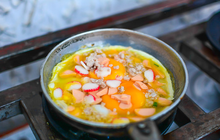 Breakfast, hot coffee, hot tea, fried eggs pan.の写真素材