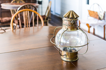 Old fashioned lantern. Hurricane lamp