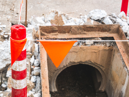 Maintenance of sewer drainage repair site on the road.の写真素材