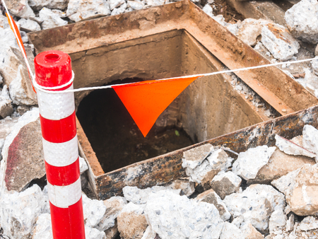 Maintenance of sewer drainage repair site on the road.の写真素材