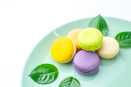 Colorful french macarons on white background.の写真素材
