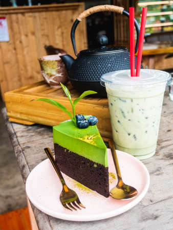 Piece of green tea chocolate cakeの写真素材