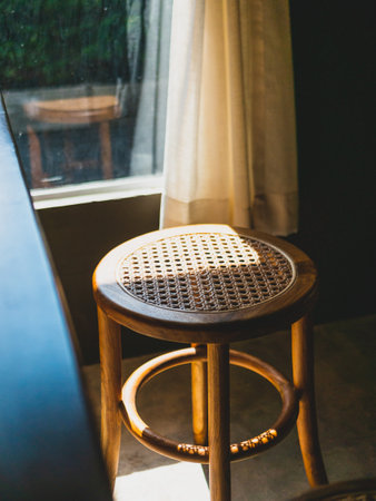 Table and chairs in the garden cafe.の写真素材