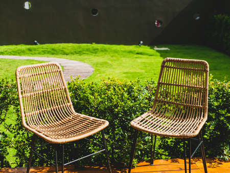 Table and chairs in the garden cafe.の写真素材