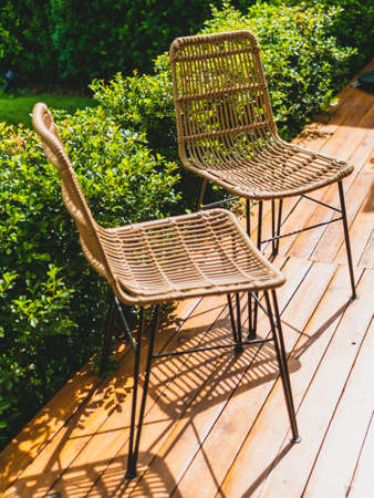 Table and chairs in the garden cafe.の写真素材
