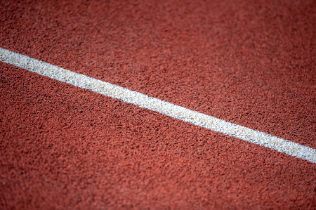 White line on running trackの写真素材