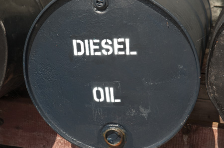 large black metal oil drum for heavy machinearyの写真素材