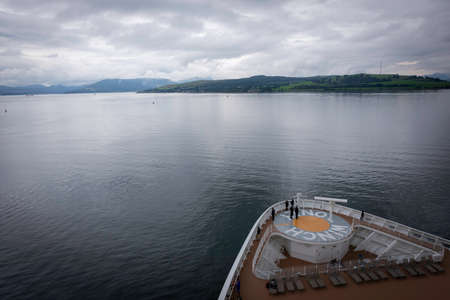 Large ship front on the sea near land