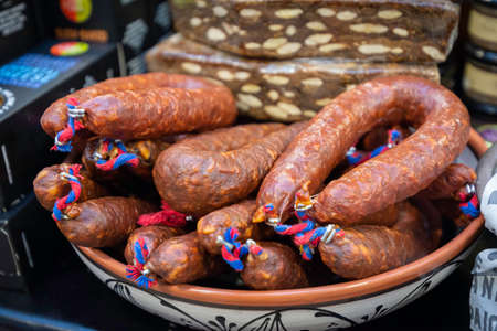 Sausages on plate at marketの写真素材