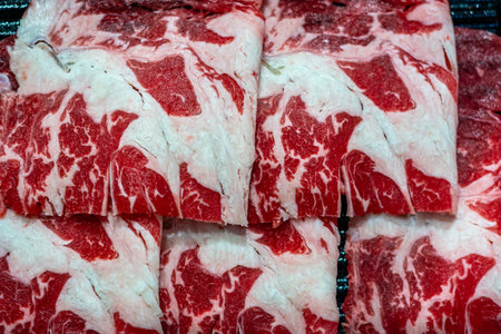 Raw beef in the market for sale. Close-up view.