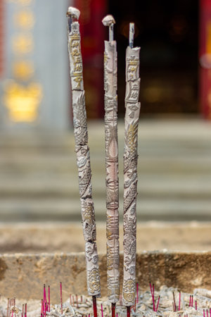 Incense sticks in a temple, closeup of photo with shallow depth of fieldの写真素材
