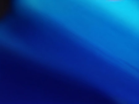 abstract blue background with some smooth lines in it and some blur on itの素材