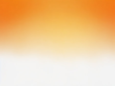 Abstract blurred orange and yellow gradient background for design with copy space.の素材