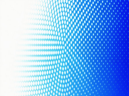 abstract background with white and blue halftone dots on blueの素材