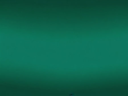 abstract green background with some smooth lines in it and some spots on itの素材