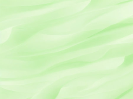 Closeup of rippled light green silk fabric cloth texture backgroundの素材