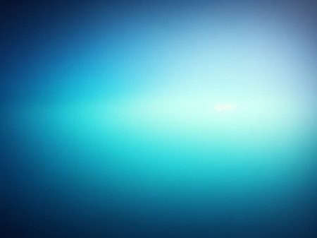 Abstract blue gradient background. Blurred bokeh light effect.の素材