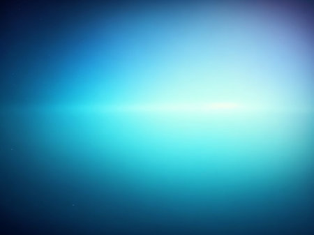 Abstract blue background with lens flare and space for text or image.の素材