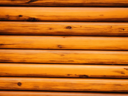 Wooden wall of a house as a background. Texture close upの素材