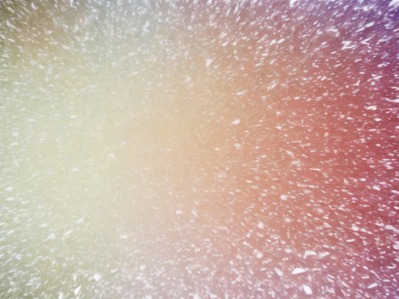 abstract winter background with snowflakes and bokeh effectの素材