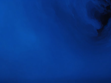 blue background with some smooth lines in it and some clouds in itの素材