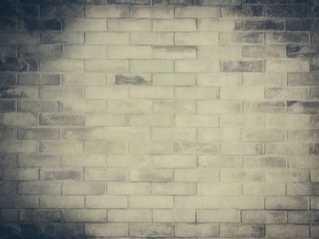 Old grunge brick wall texture background. Vintage tone filter effect.の素材