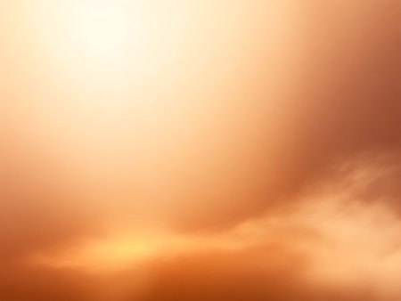 Orange sunset sky with clouds and sunbeams. Nature background.の素材