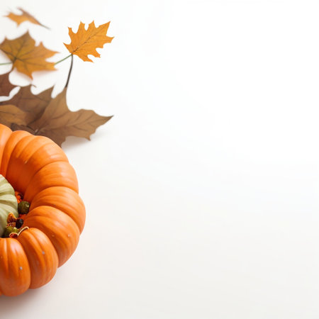 Autumn composition with pumpkins and leaves on a white background.の素材