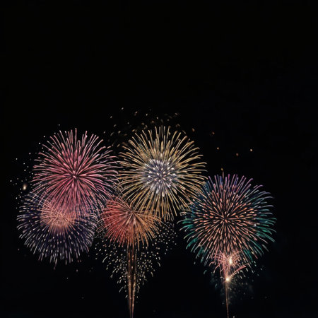 Colorful fireworks of various colors over night sky, celebration and anniversary conceptの素材