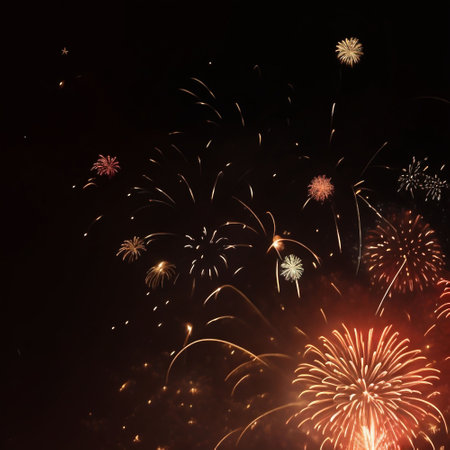 Colorful fireworks of various colors over night sky with copyspaceの素材