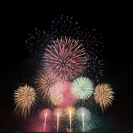 Colorful fireworks of various colors over night sky background, celebration conceptの素材