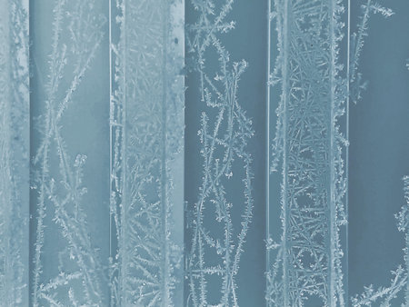winter frosty background with snow patterns and frost on a ribbed texture