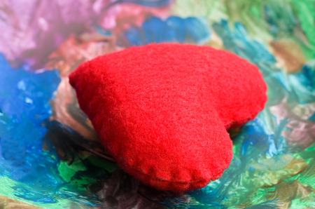 red heart on plate multi colorの写真素材