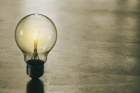 light bulb on wood background