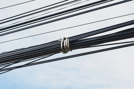 wire pole with sky backgroundの写真素材