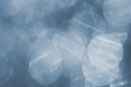 silver lights defocused.bokeh abstract for christmas backgroundの写真素材