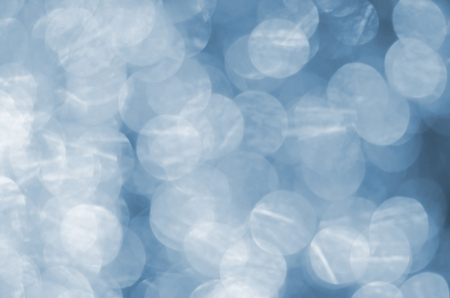 silver lights defocused.bokeh abstract for christmas backgroundの写真素材