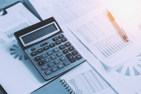 business accounting concept financial with calculator pen notbook on deskの写真素材
