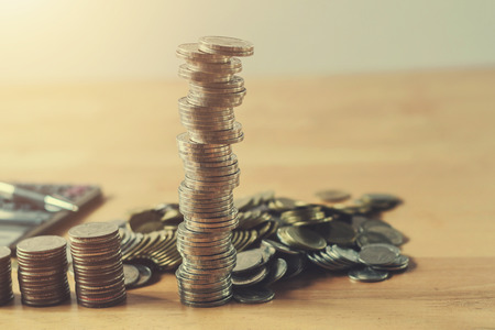 money stack on desk in office. concept saving financeの写真素材