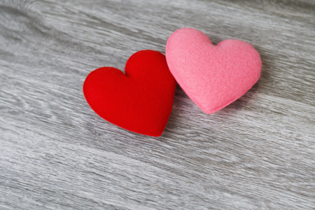 heart red and pink color on wood background. concept valentine dayの写真素材