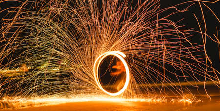 Swing fire dancing show on the beach .Koh Samet, Thailandの写真素材