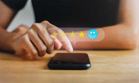 customer services best excellent business rating experience. Satisfaction survey concept. Hand of people chooses  smile face circle on mobile. 5 Star Satisfactionの写真素材