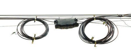 electric black wire cable curled shaped isolate on white backgroundの写真素材