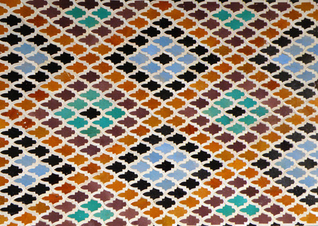 Moroccan Style Diamond-shaped pattern Bright Blue Orange Brown Color Tiled Wall in Fez, Morocco,...
