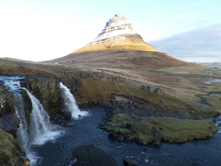 The Famous Kirkjufell Mountain and Kirkjufellsfoss Waterfall in Icelandの写真素材
