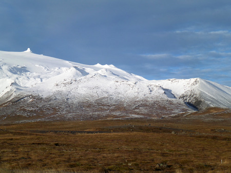 Snow Capped Mountain along the Road in Snaefellsnes Peninsula , Icelandの写真素材