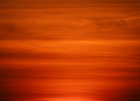 Stunning red color gradation of the sunset sky in Northern Thailandの写真素材